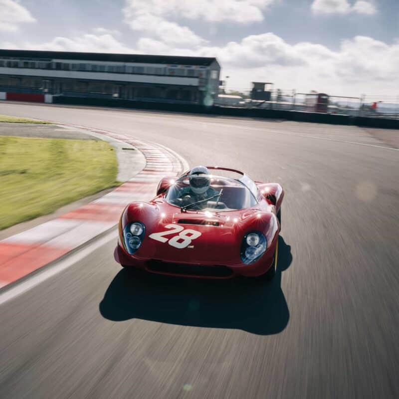 Ferrari Dino 206S Spider on bend at donington park