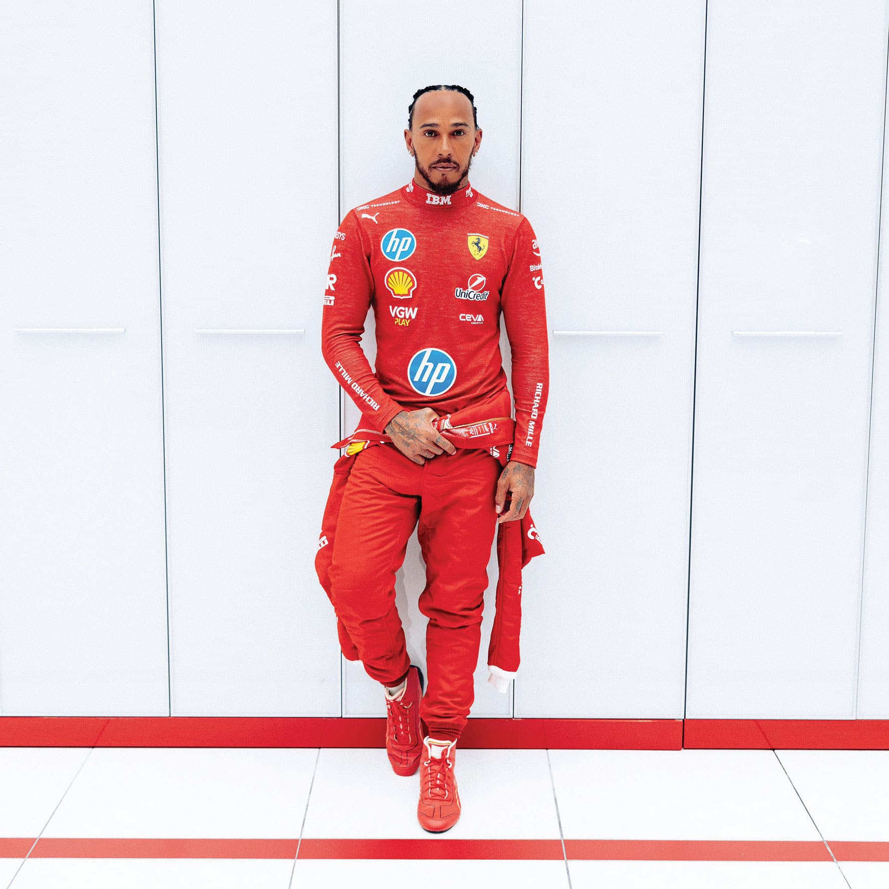 Lewis Hamilton in red Ferrari suit